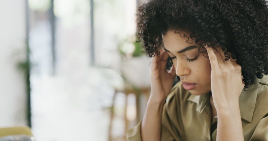 Closeup shot of a young woman looking stressed out