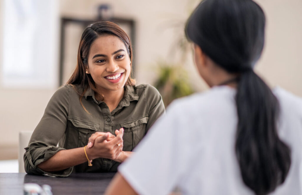 Woman talking to professional botox injector